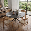 Tavolo da Pranzo Rotondo Stile Industriale Ø120x75 cm con Piano in Truciolato e Gambe a Croce in Acciaio Nero      
