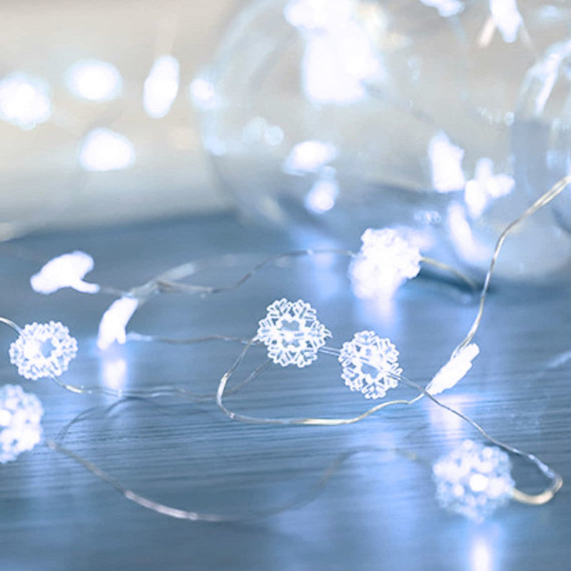 Luci di Natale 50 MicroLed a forma di Fiocco di Neve Bianco Freddo a batteria da Interno