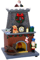 Babbo Natale nel Camino in Resina con Luci e Suoni 19,5x18,5x33 cm