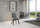 Chaise Trudy 52x52x87 cm Pieds anthracite simili cuir Gris