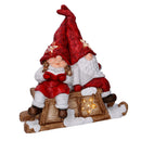 Pupazzo Babbo Natale con Led in Resina con bimba rosso cm 40x26xh15