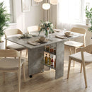 Tavolo da Pranzo Pieghevole 140x80x74 cm con Ripiani Ribalta e Ruote in Melamina Grigio Cemento      