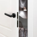 Maniglie Mackay per Porta da Interno con Rosetta Ø50 mm Alluminio Nero 5 Sets. Emuca