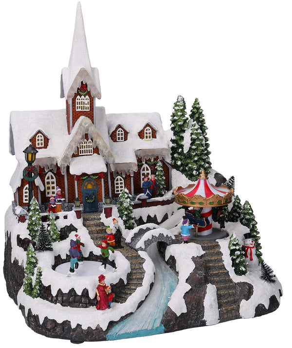Village de Noël en Résine Église et Patinoire avec Lumières et Sons 33x31xh38 cm Adami acquista