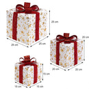 Set 3 Pacchi Regalo Natalizi Luminosi 25-20-15 cm con LED Bianco Caldo e USB Bianco e Oro con Fiocco Rosso      