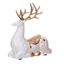 Renna resina seduta oro e bianco cm 17x8xh20