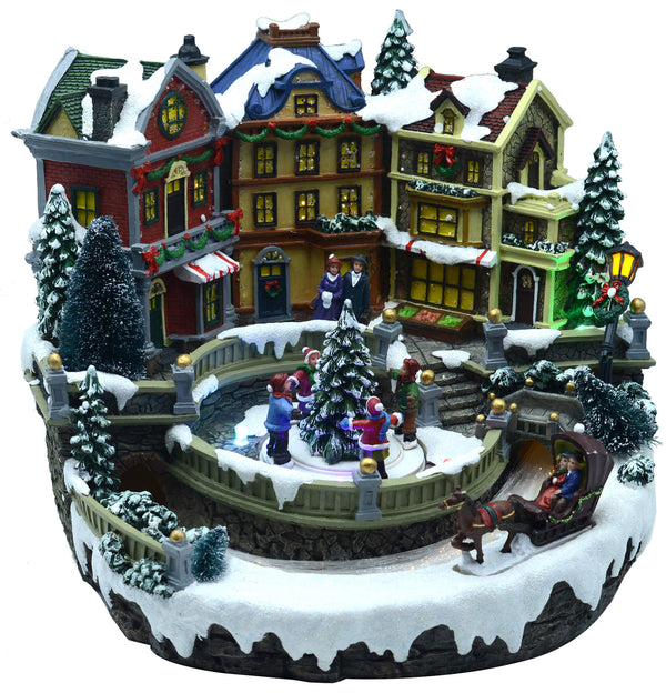 Village de Noël en sapin en résine avec lumières et sons 32x30xh26,5 cm Adami sconto