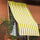 Store pour Overlap 290x290 cm avec anneaux renforcés Jaune