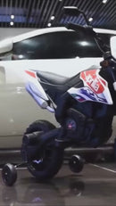 Moto électrique pour enfants 12V avec permis Aprilia Motocross RX125 Blanc