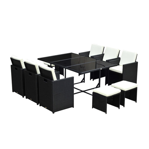 prezzo Ensemble de table et 6 chaises de jardin en fer et rotin synthétique 4 repose-pieds et coussins noirs